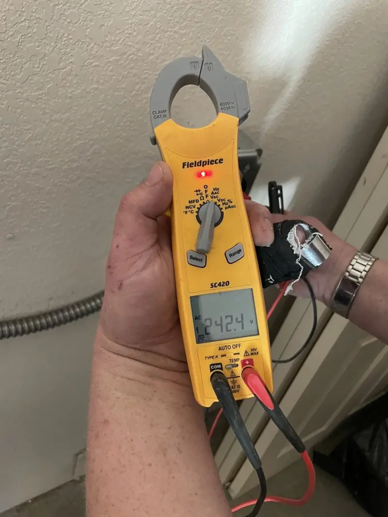 Voltage testing with clamp meter during Hot Tub / Pool Electrical Wiring in Pratt
